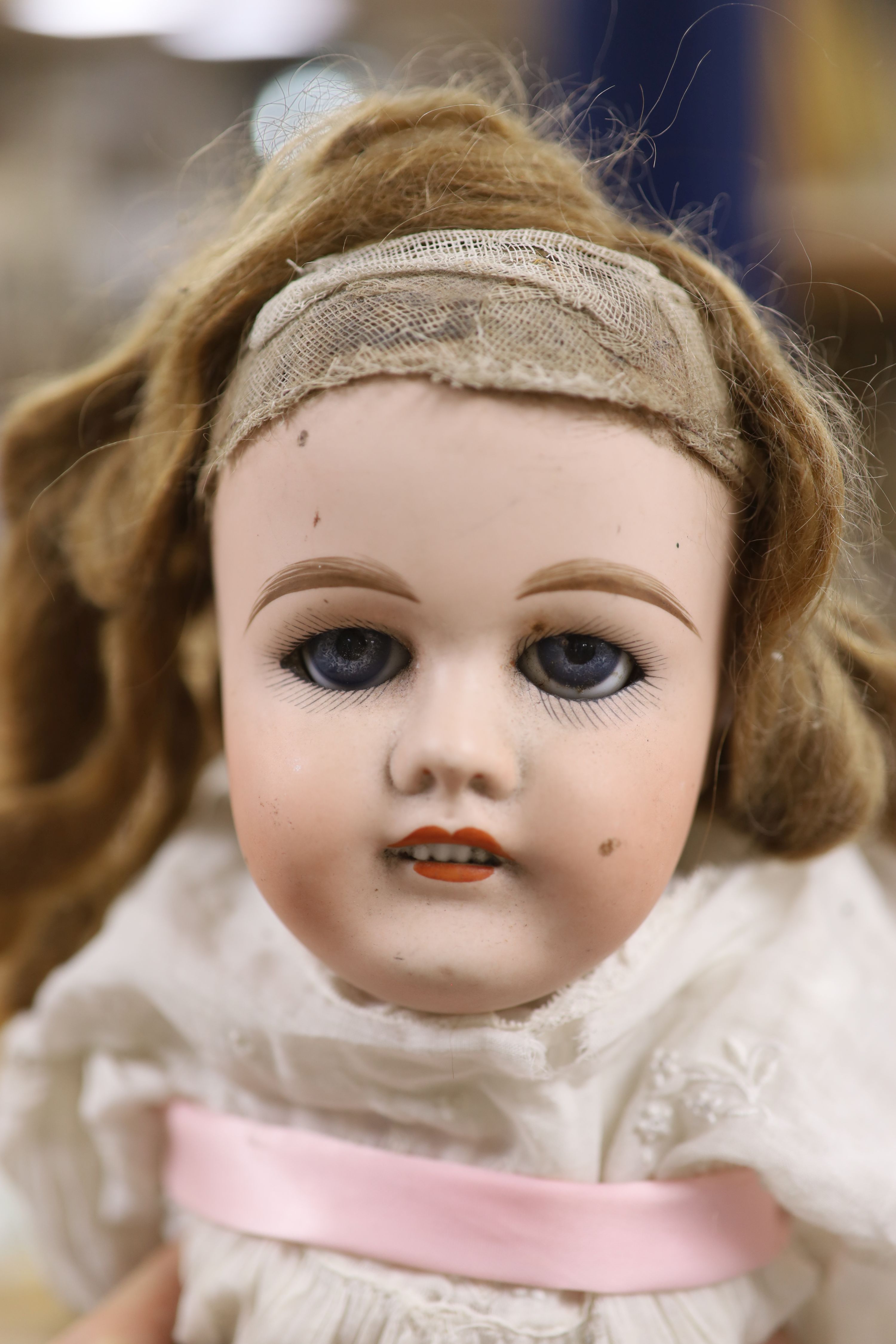 A French Mon Cheri doll, with jointed body, height 20 inches, 51cm